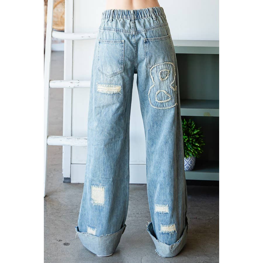 WASHED LOVE LETTER PATCHED DENIM JEANS